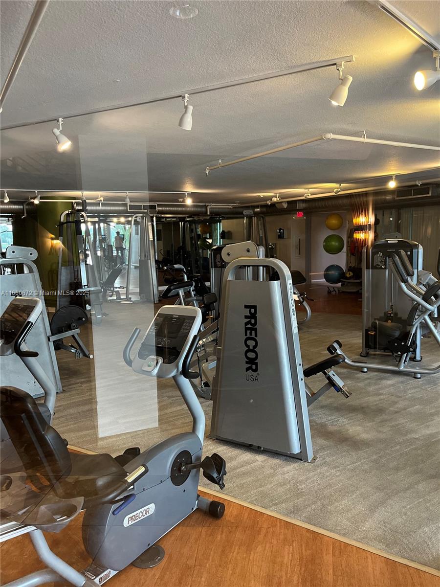 2681 North Flamingo Road, Unit 2108S Sunrise, FL 33323 - Photo 20 of 20 a view of a room with gym equipment