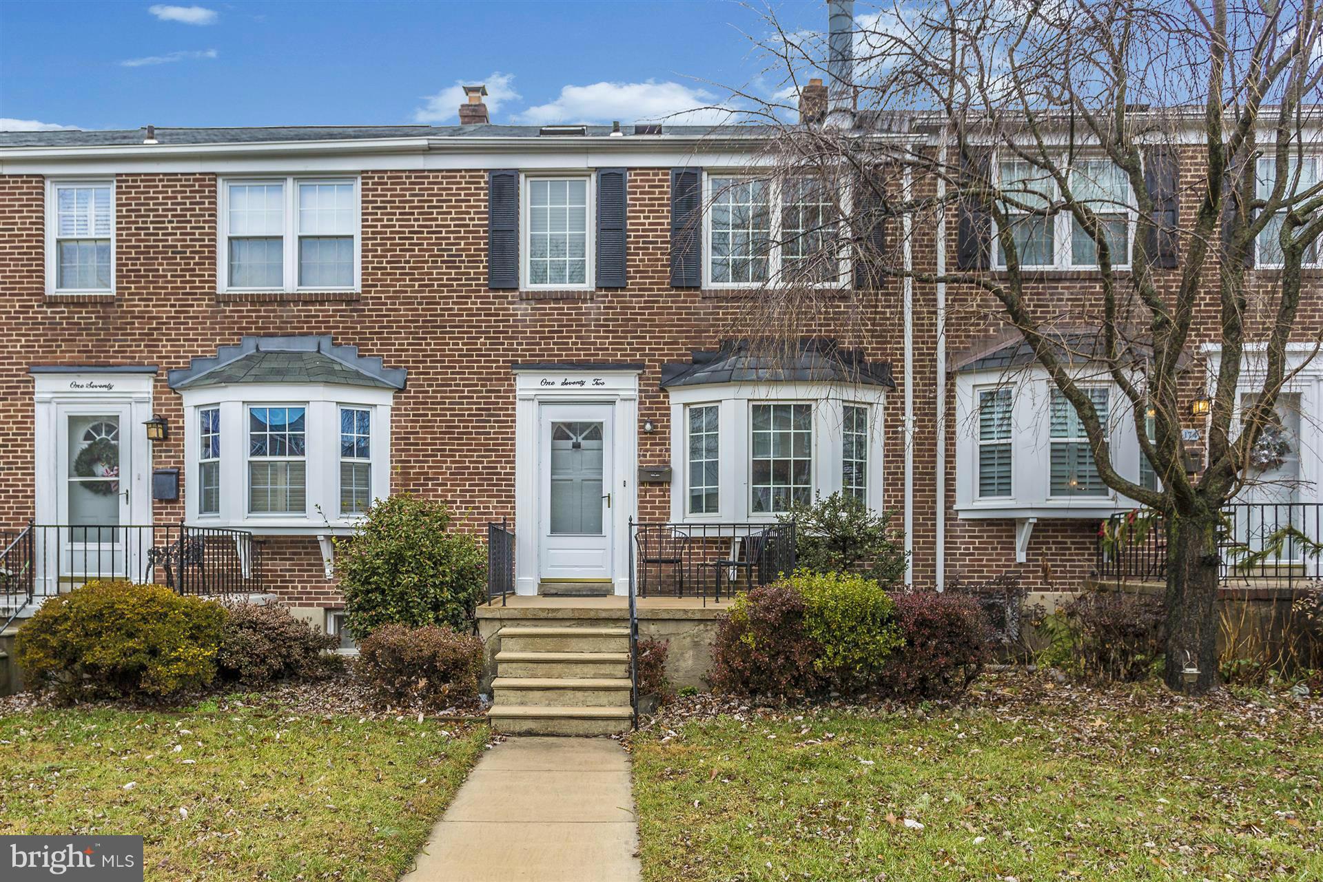 172 Stanmore Road Baltimore, MD 21212 - Photo 1 of 30 a front view of a house with a yard