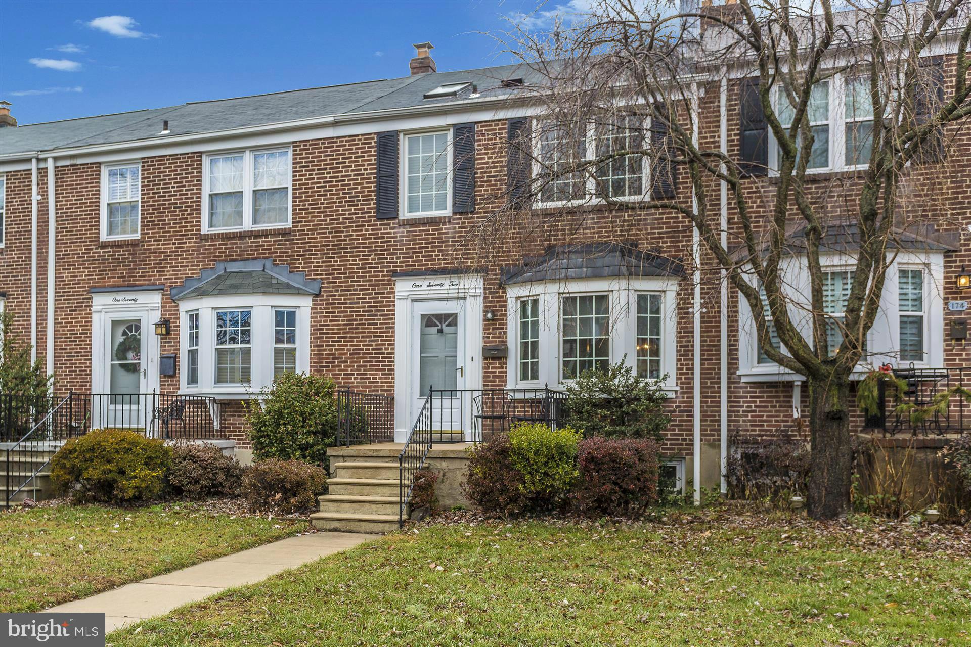 172 Stanmore Road Baltimore, MD 21212 - Photo 2 of 30 a front view of a house with a yard