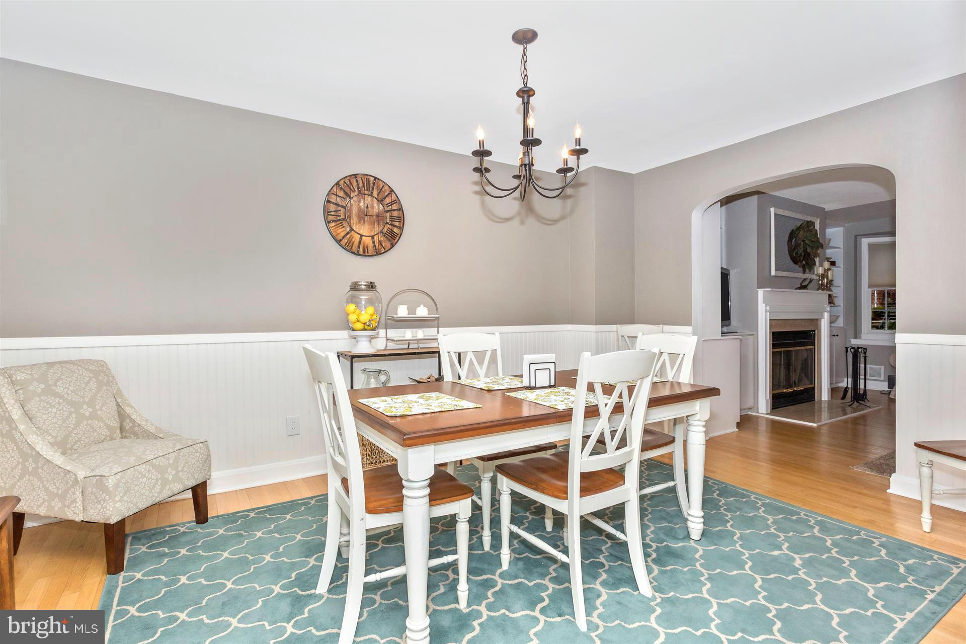 172 Stanmore Road Baltimore, MD 21212 - Photo 11 of 30 a view of a dining room with furniture and chandelier