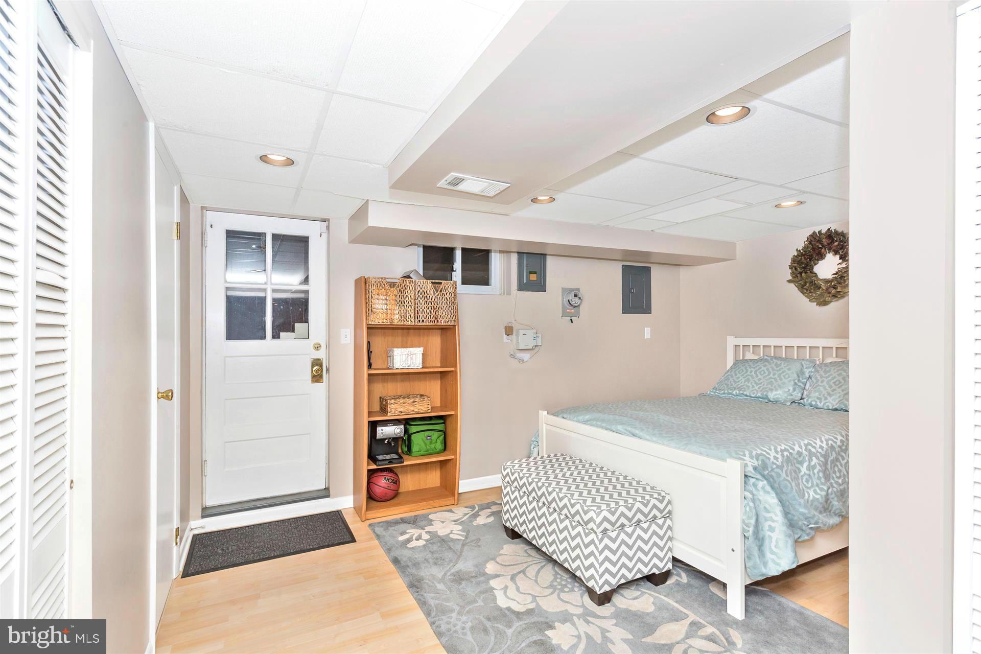 172 Stanmore Road Baltimore, MD 21212 - Photo 26 of 30 a spacious bedroom with a bed and a window