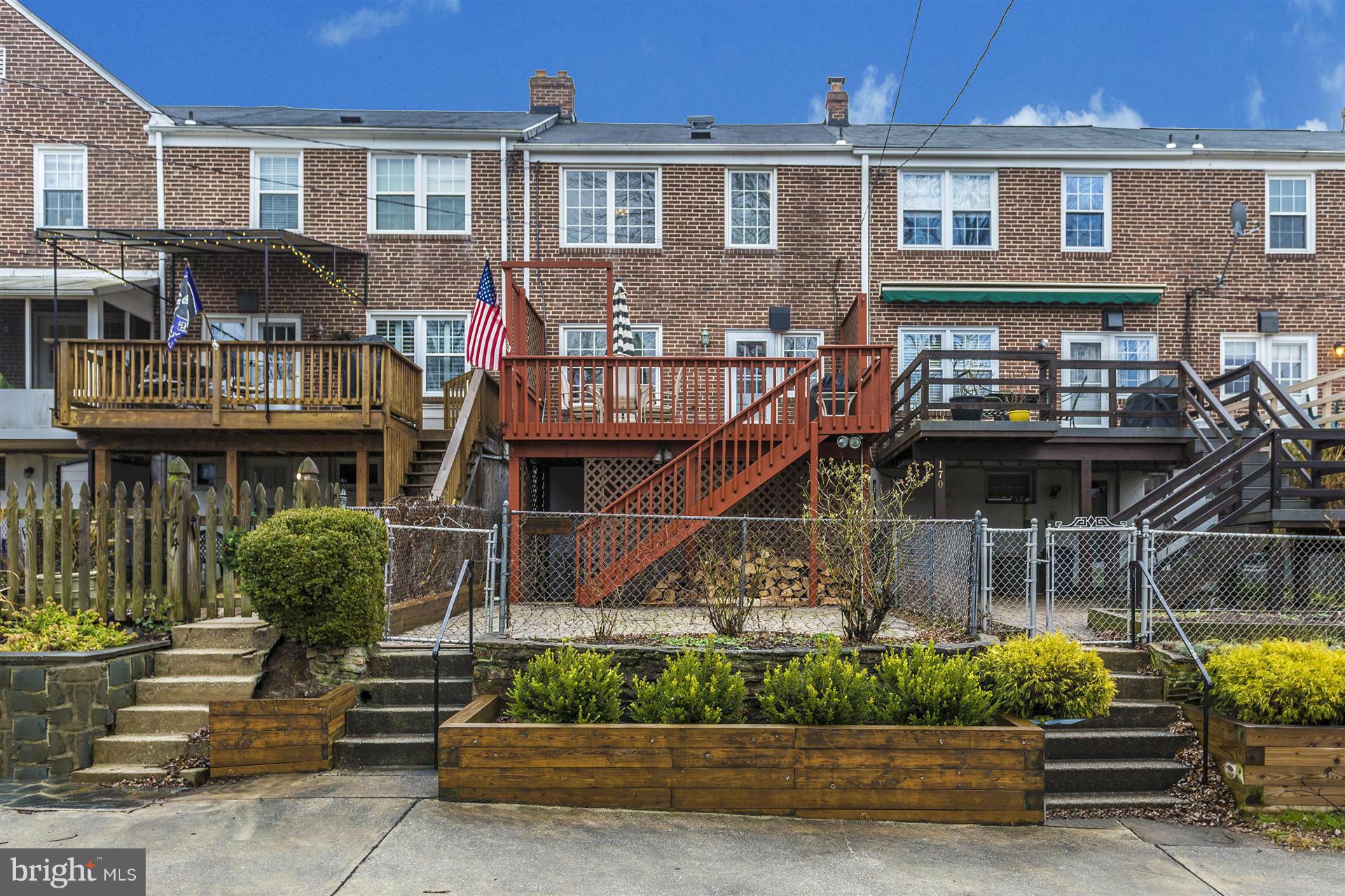 172 Stanmore Road Baltimore, MD 21212 - Photo 29 of 30 a front view of a house with a garden