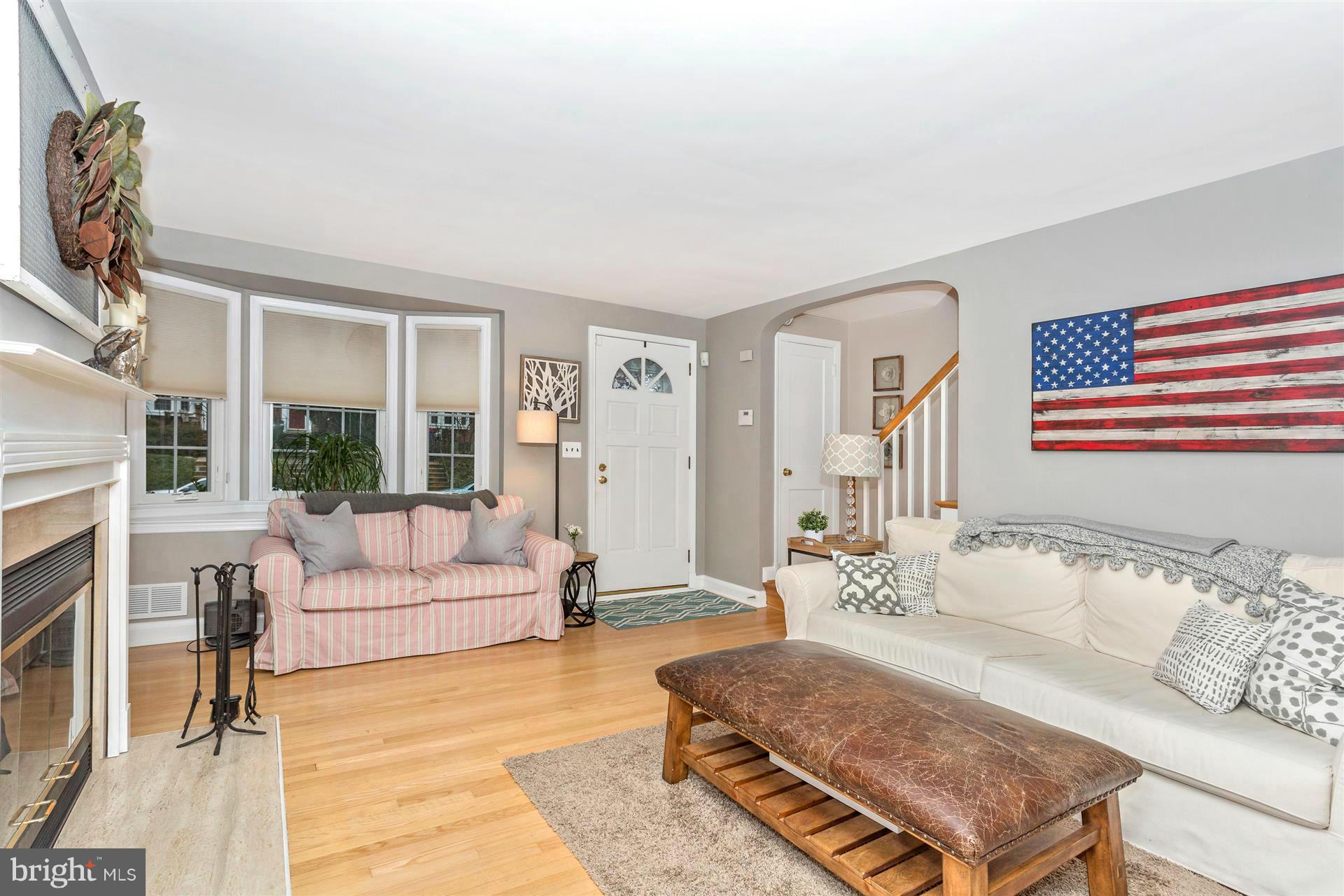 172 Stanmore Road Baltimore, MD 21212 - Photo 4 of 30 a living room with furniture and a fireplace