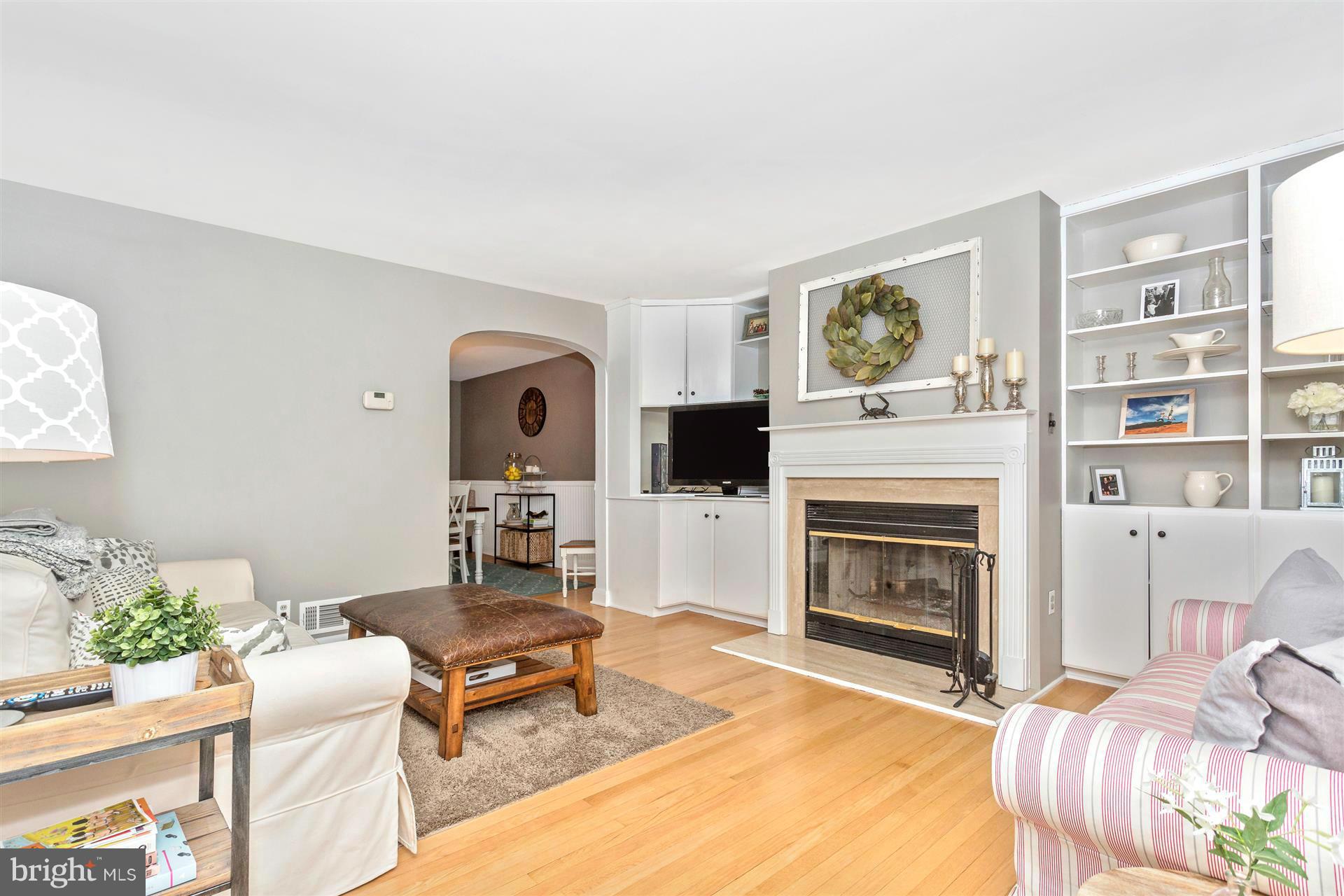 172 Stanmore Road Baltimore, MD 21212 - Photo 7 of 30 a living room with furniture and a fireplace