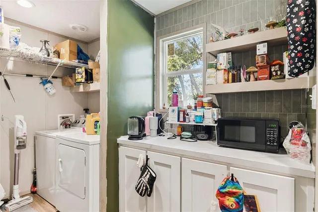 a kitchen with a stove and cabinets