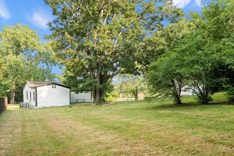 a fire hydrant in the middle of a field