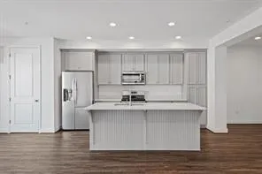 a view of kitchen with wooden floor