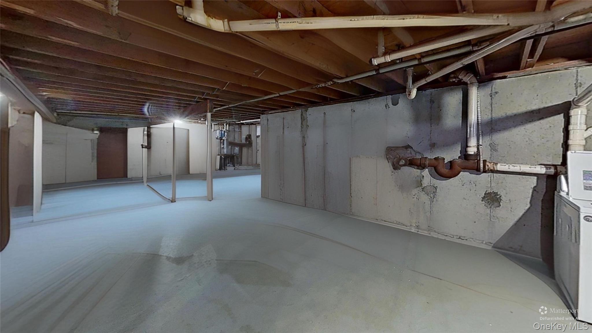 347 Miller Place Road Miller Place, NY 11764 - Photo 24 of 29 Full basement is featured here in a DEFURNISHED photo!