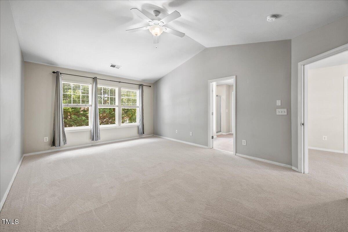 8404 Split Stone Lane Raleigh, NC 27613 - Photo 24 of 45 a view of an empty room with a window