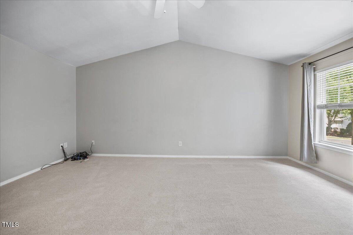 8404 Split Stone Lane Raleigh, NC 27613 - Photo 25 of 45 an empty room with windows