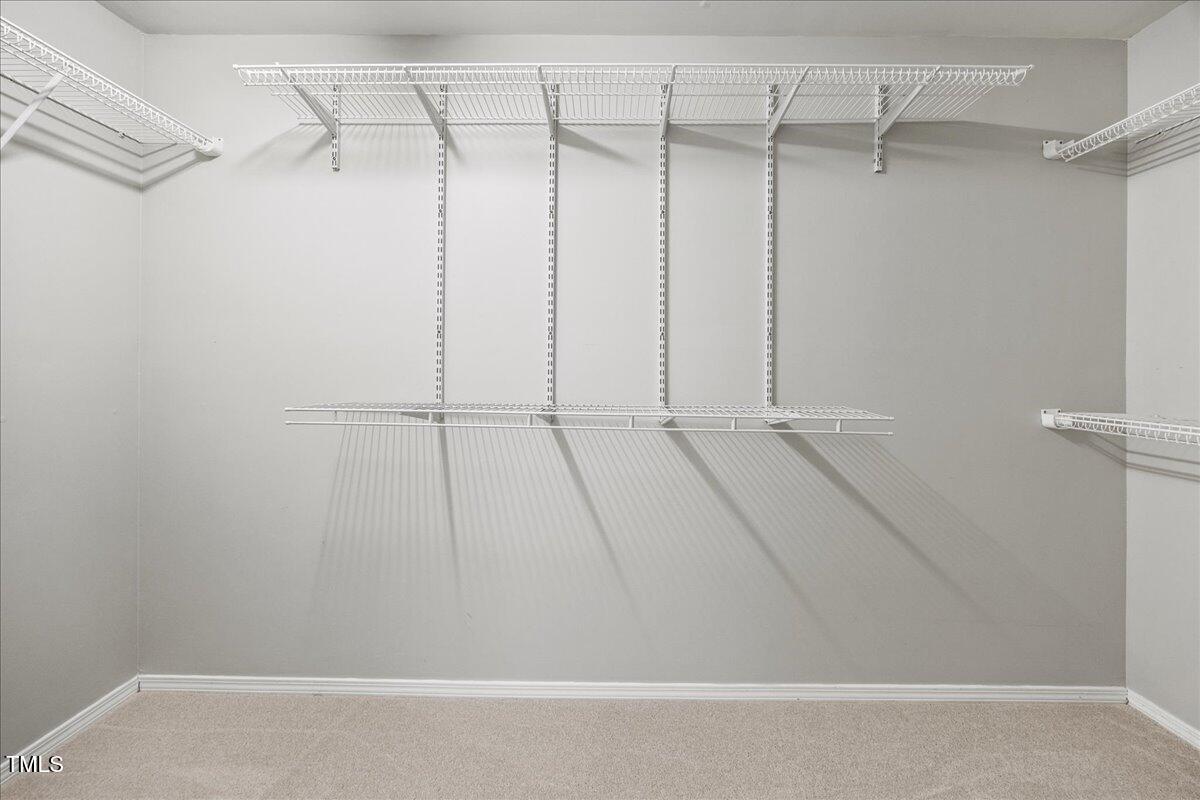 8404 Split Stone Lane Raleigh, NC 27613 - Photo 28 of 45 a view of an empty walk in closet