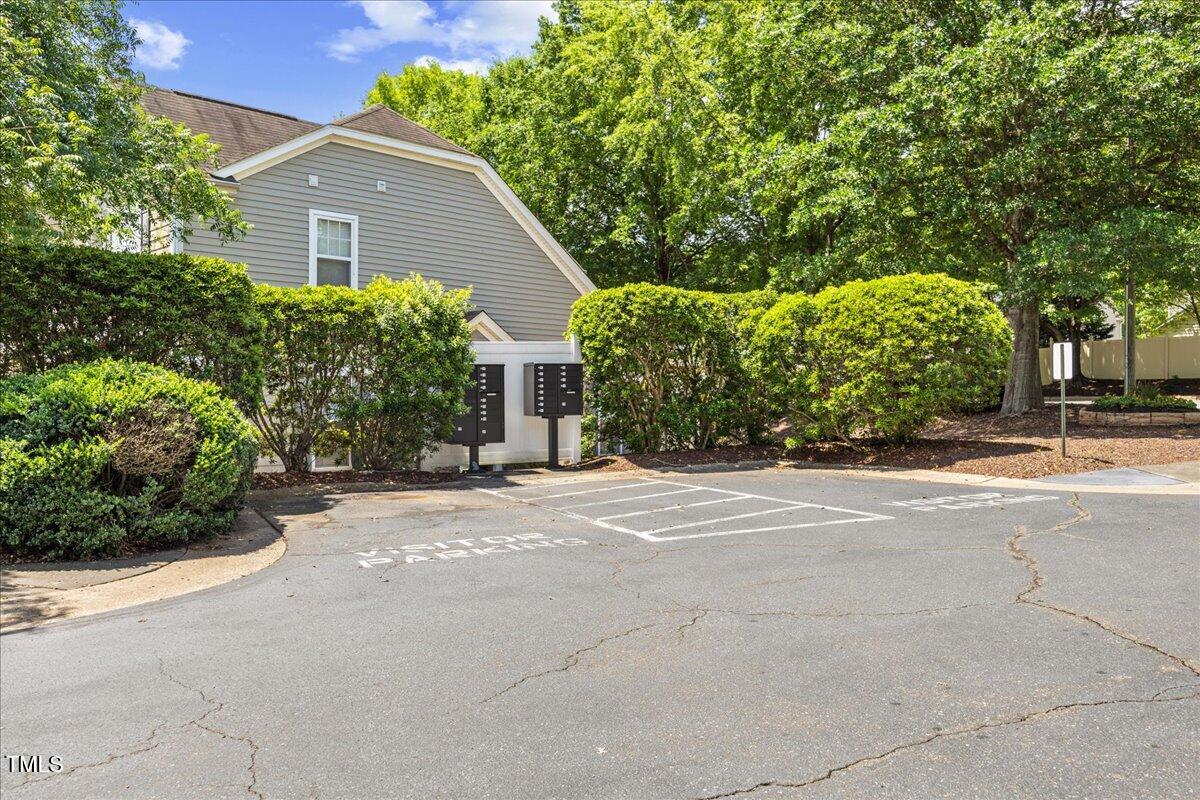 8404 Split Stone Lane Raleigh, NC 27613 - Photo 41 of 45 a view of a house with a yard and garage