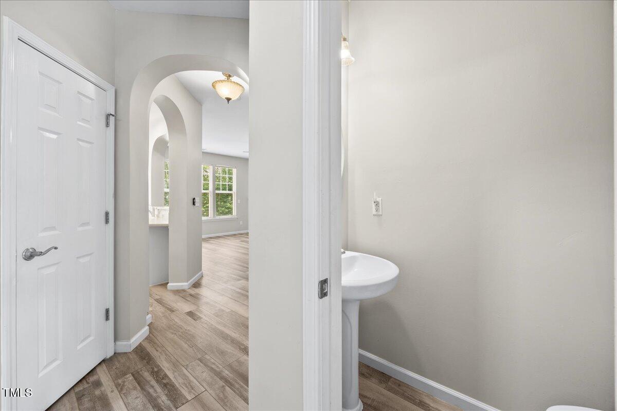 8404 Split Stone Lane Raleigh, NC 27613 - Photo 7 of 45 wooden floor in a gallery