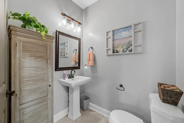 a view of walk in closet with clothes