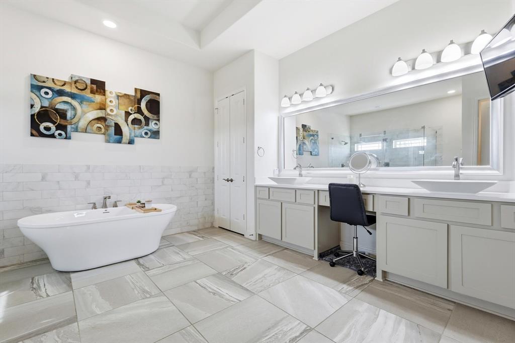 7751 Faught Road Northlake, TX 76226 - Photo 20 of 39 Freestanding soaking tub with floor-to-ceiling tiled wall