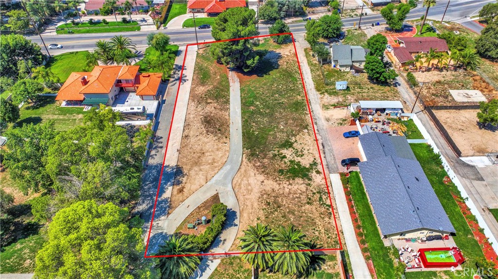 11553 Reche Canyon Road Colton, CA 92324 - Photo 3 of 13 an aerial view of residential houses with outdoor space