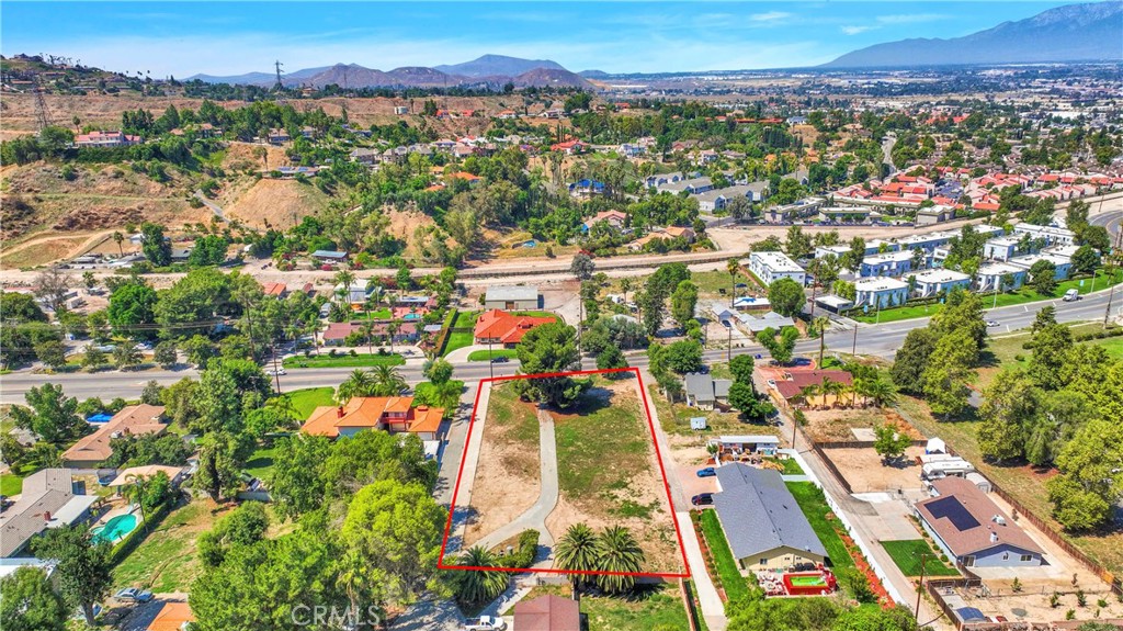 11553 Reche Canyon Road Colton, CA 92324 - Photo 4 of 13 an aerial view of residential houses with outdoor space