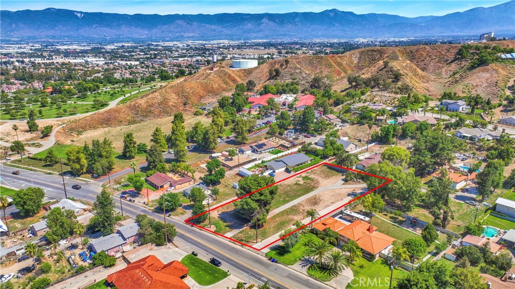 11553 Reche Canyon Road Colton, CA 92324 - Photo 7 of 13 an aerial view of residential houses with outdoor space