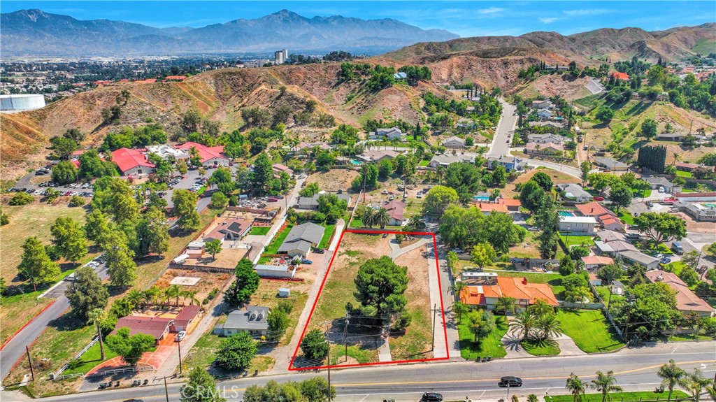11553 Reche Canyon Road Colton, CA 92324 - Photo 8 of 13 an aerial view of residential houses with outdoor space and seating