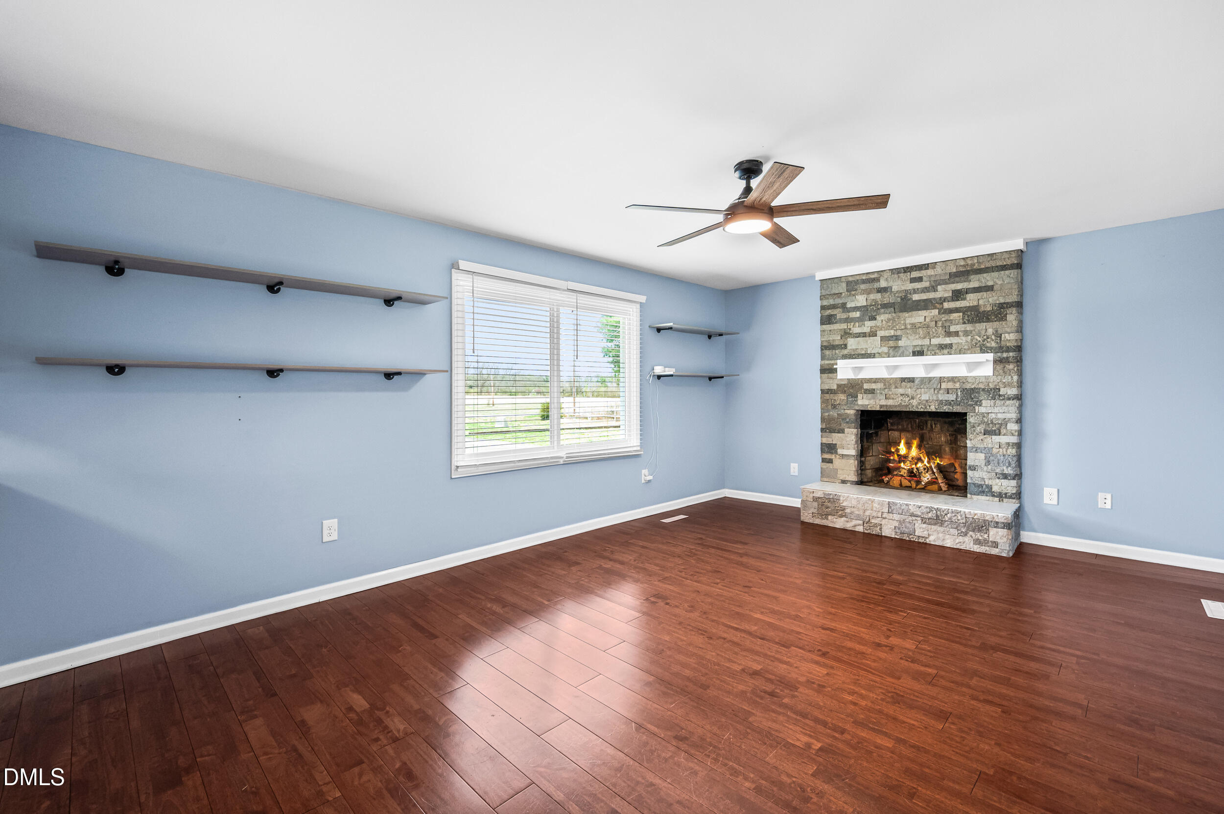 1896 Old Rte 22 Kenly, NC 27542 - Photo 11 of 32 wooden floor in an empty room with a window