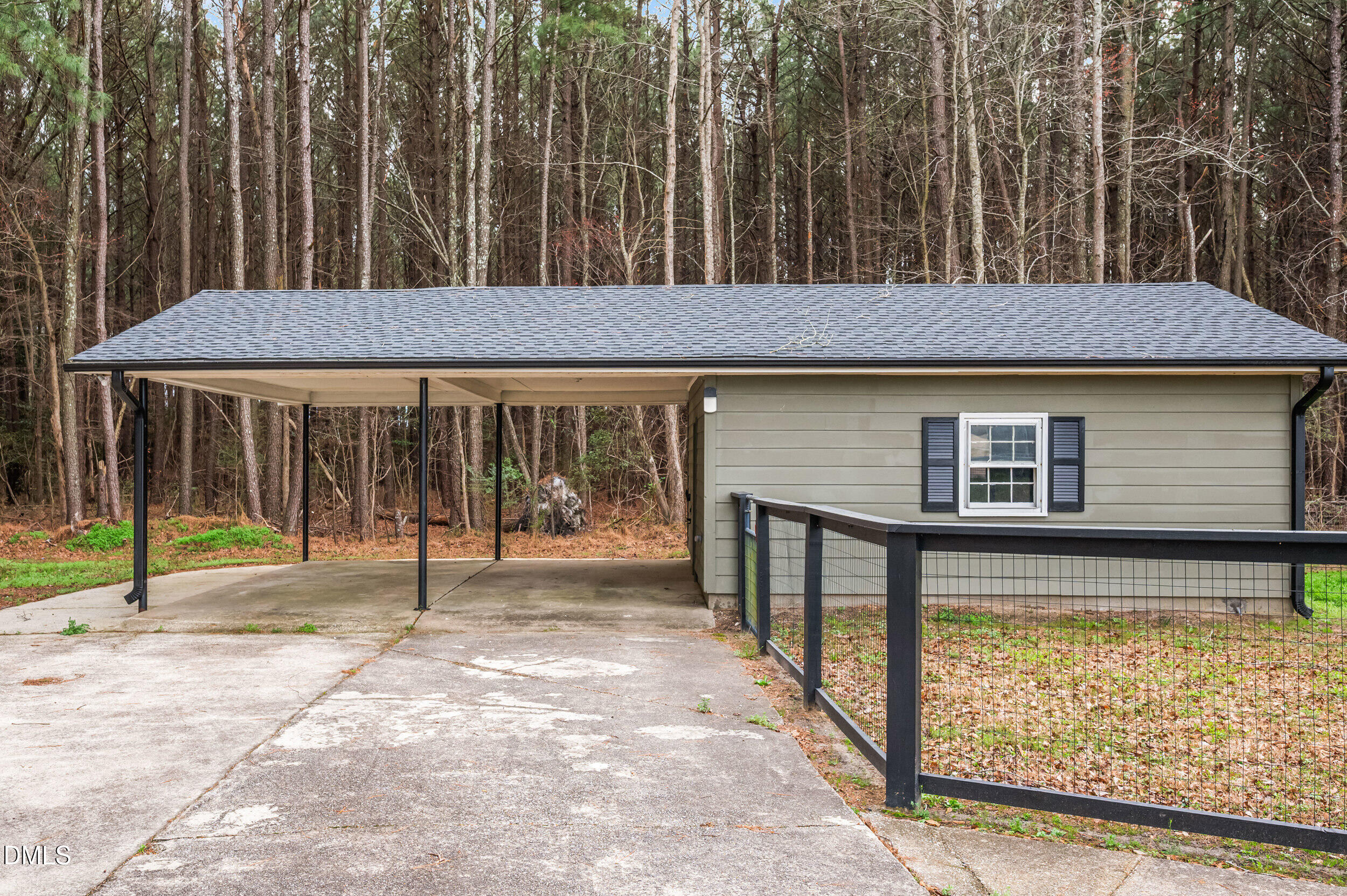 1896 Old Rte 22 Kenly, NC 27542 - Photo 25 of 32 a backyard of a house with table and chairs