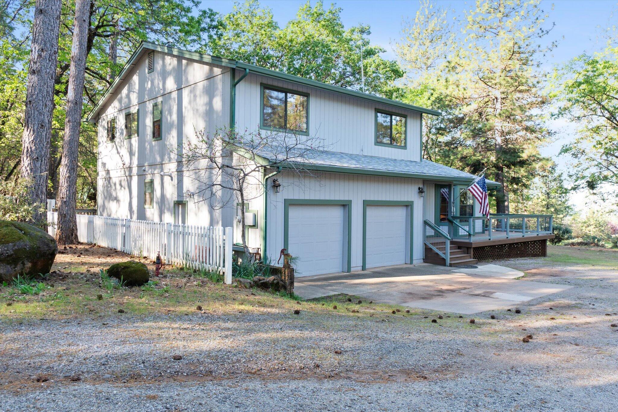 26997 Lookout Mountain Road Oak Run, CA 96069 - Photo 59 of 92 a view of a house with a yard and tree