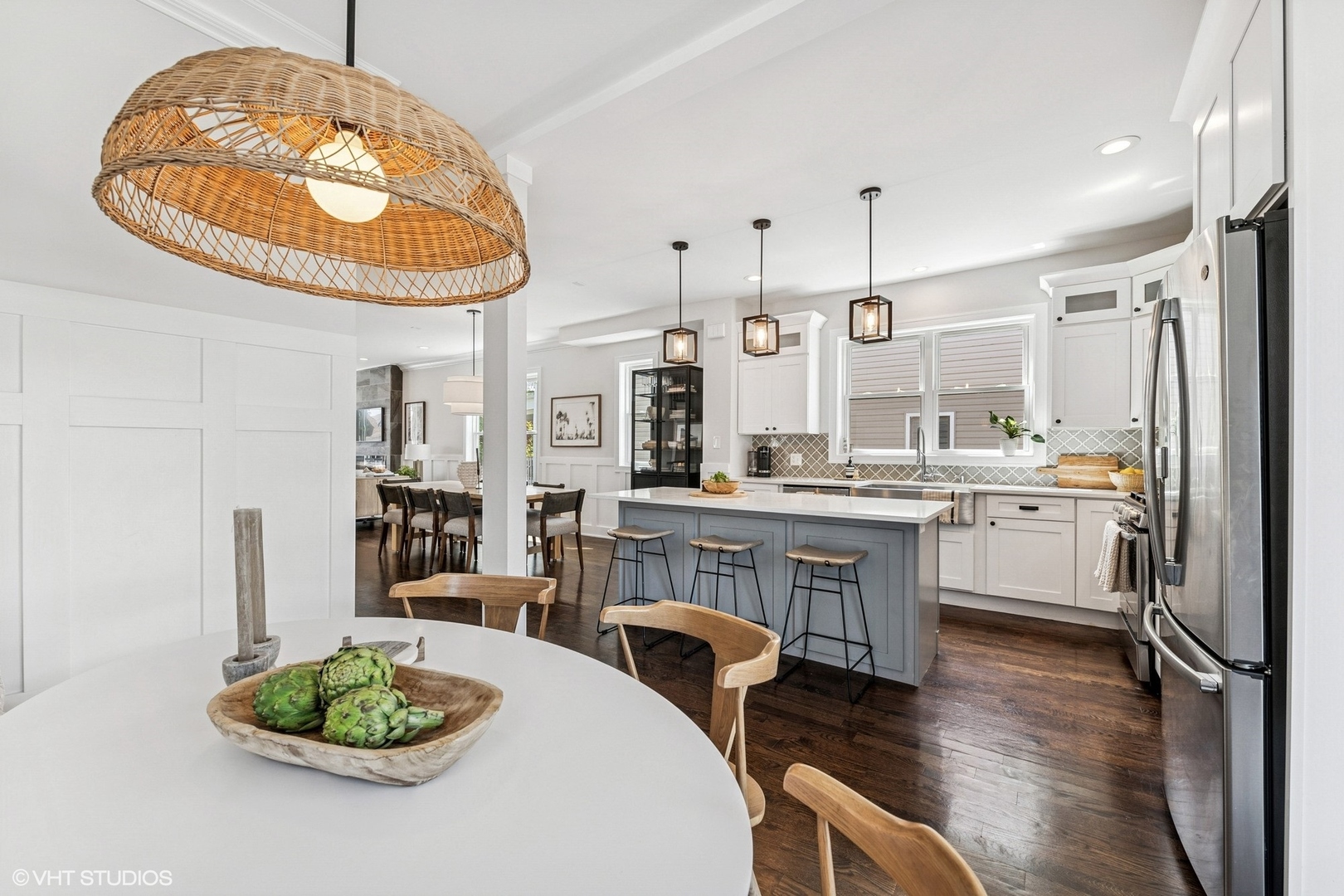 4328 North Ridgeway Avenue Chicago, IL 60618 - Photo 11 of 32 a kitchen with stainless steel appliances granite countertop a sink a stove and a wooden floors