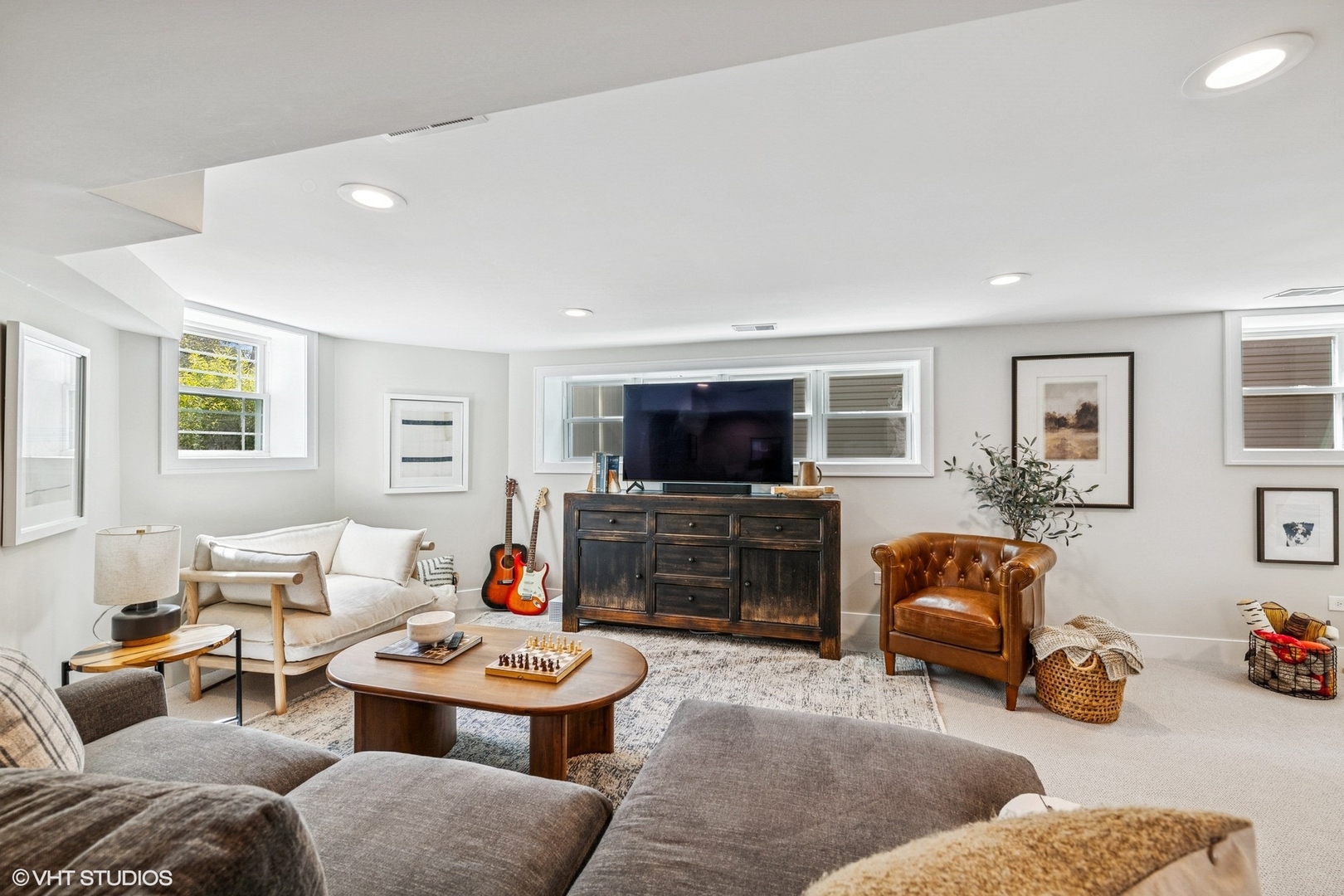 4328 North Ridgeway Avenue Chicago, IL 60618 - Photo 23 of 32 a living room with furniture and a flat screen tv