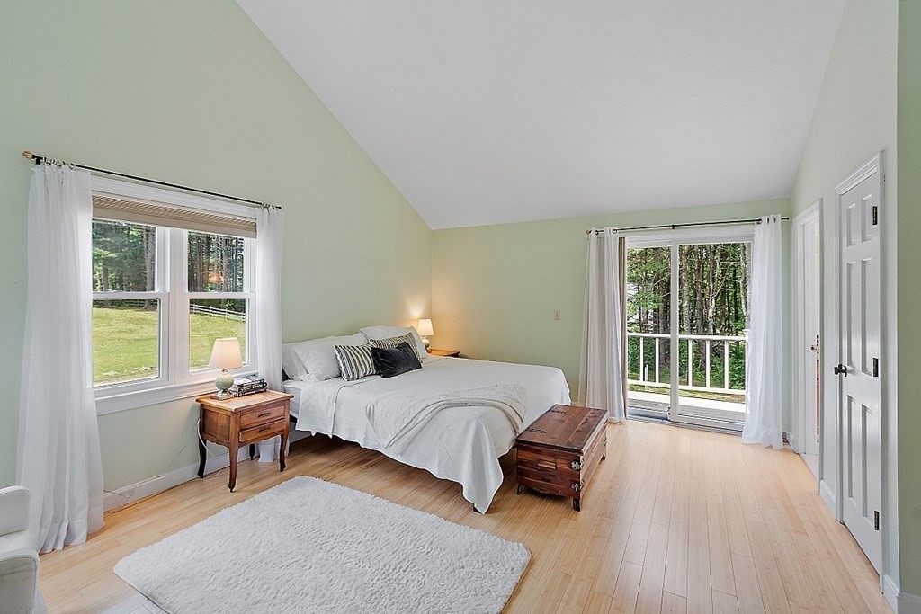 92 Sampson Road Bolton, MA 01740 - Photo 25 of 42 a bedroom with a bed and a window