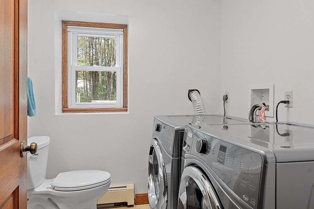 92 Sampson Road Bolton, MA 01740 - Photo 30 of 42 a utility room with dryer and washer