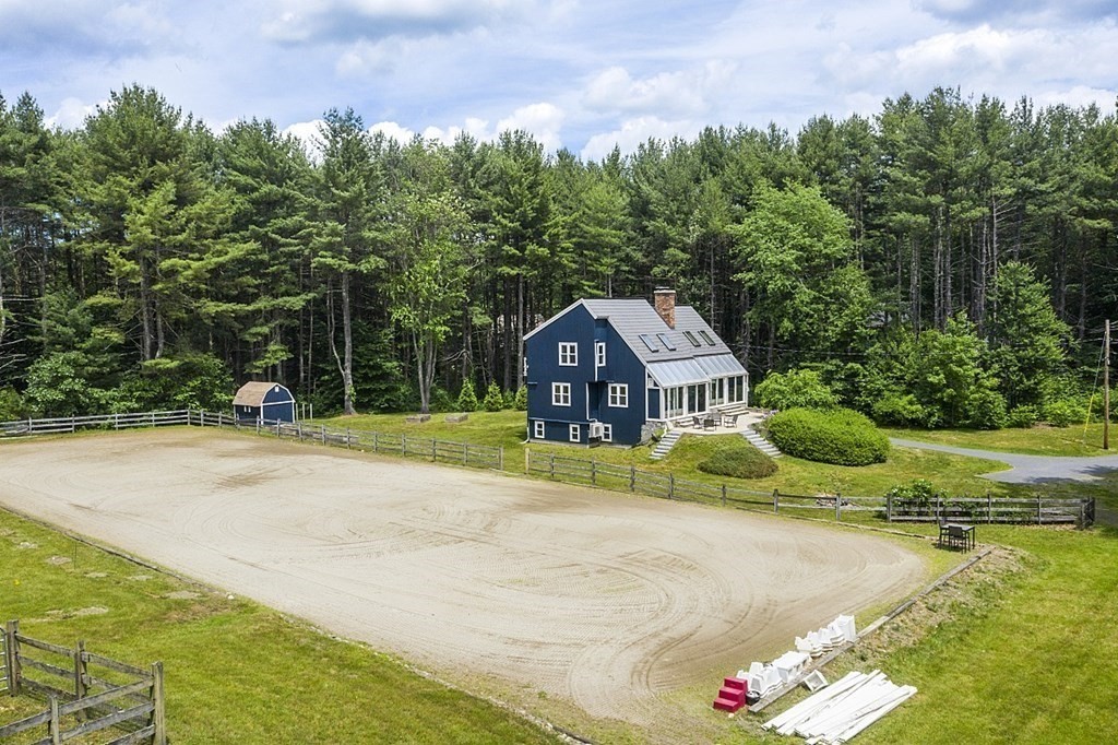 92 Sampson Road Bolton, MA 01740 - Photo 37 of 42 a front view of a house with a yard