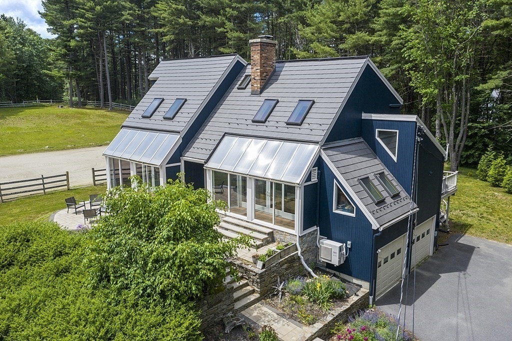 92 Sampson Road Bolton, MA 01740 - Photo 41 of 42 a aerial view of a house with a yard
