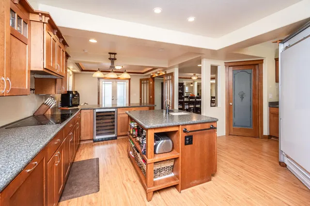 a kitchen with a sink stove and microwave