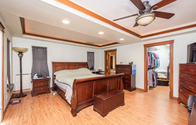 a view of livingroom with furniture wooden floor and windows