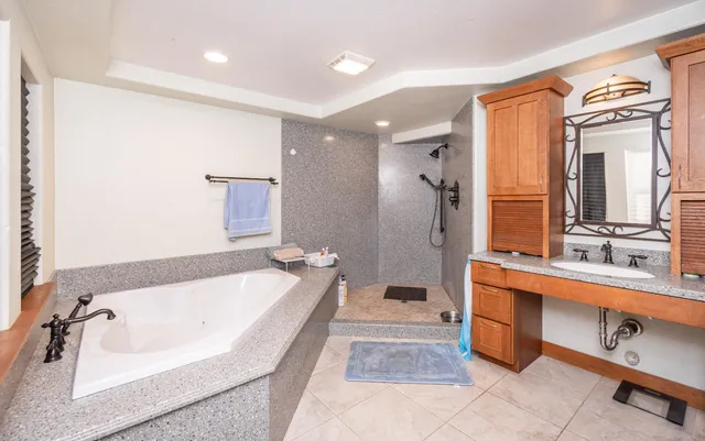 a utility room with sink dryer and washer