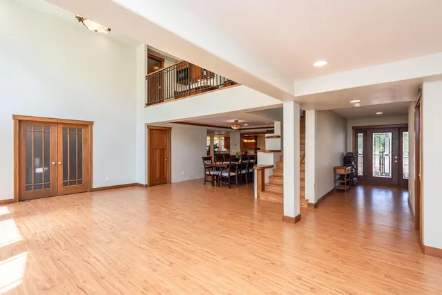 a view of a livingroom with furniture and white walls