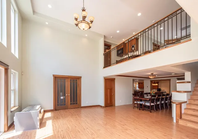 a view of livingroom with furniture and workspace