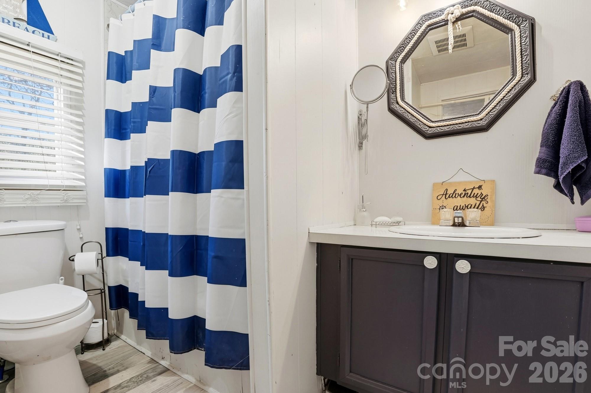 343 Carr Road Dallas, NC 28034 - Photo 15 of 22 a bathroom with a sink and a mirror