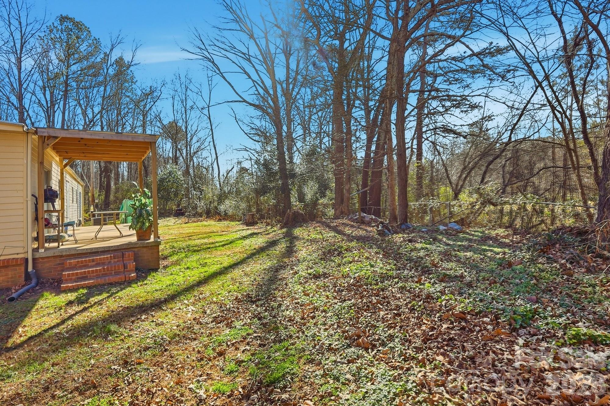 343 Carr Road Dallas, NC 28034 - Photo 20 of 22 a view of yard with tree