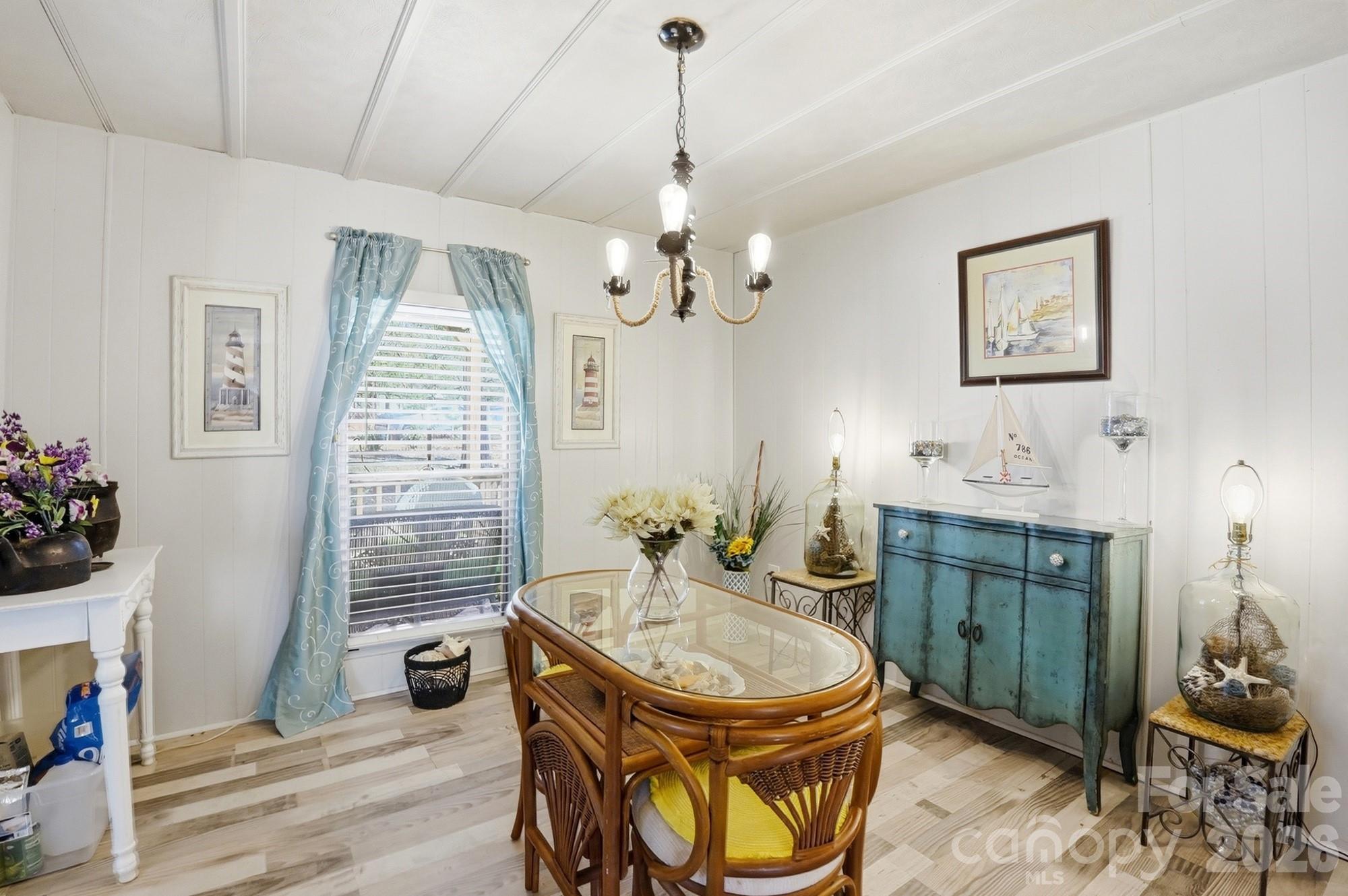 343 Carr Road Dallas, NC 28034 - Photo 7 of 22 a bathroom with a sink a mirror and a window