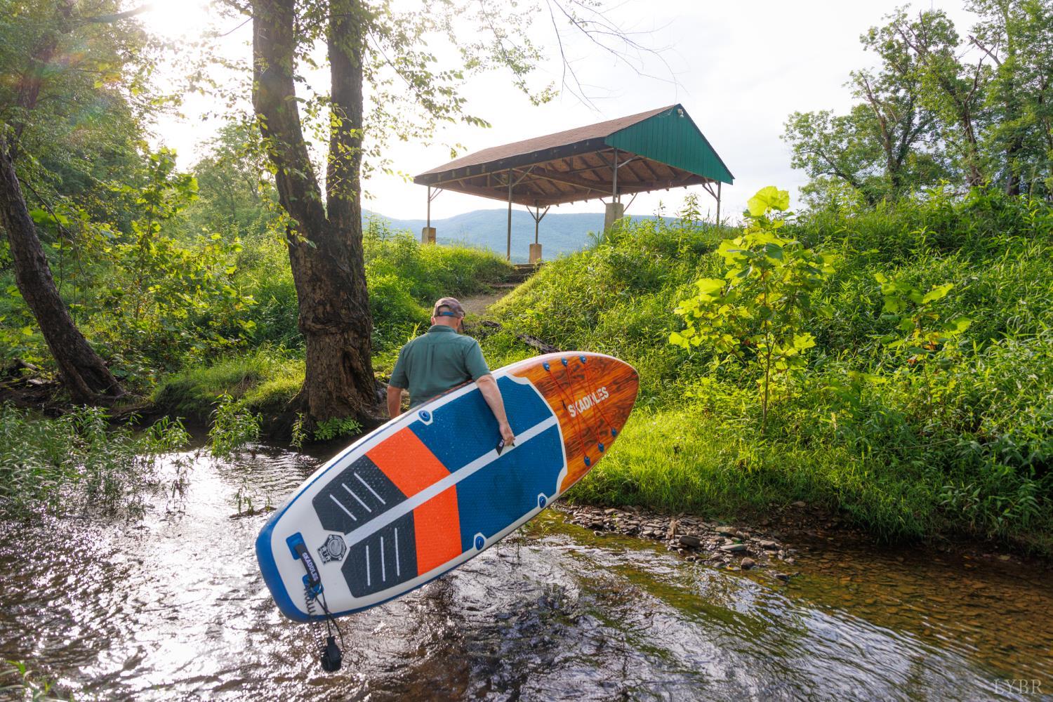 0 41 News Road Eagle Rock, VA 24085 - Photo 23 of 51 a backyard of a house with wooden floor and outdoor seating