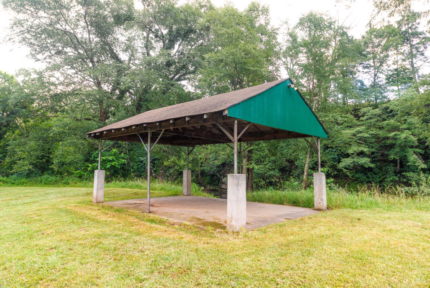 0 41 News Road Eagle Rock, VA 24085 - Photo 29 of 51 a backyard of a house with table and chairs
