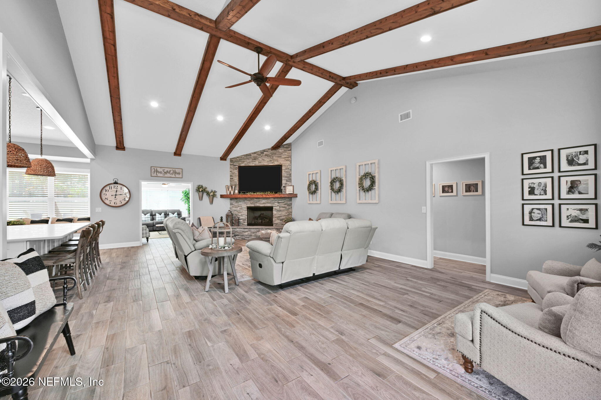 34446 Mitigation Trail Callahan, FL 32011 - Photo 12 of 84 a living room with furniture and a wooden floor