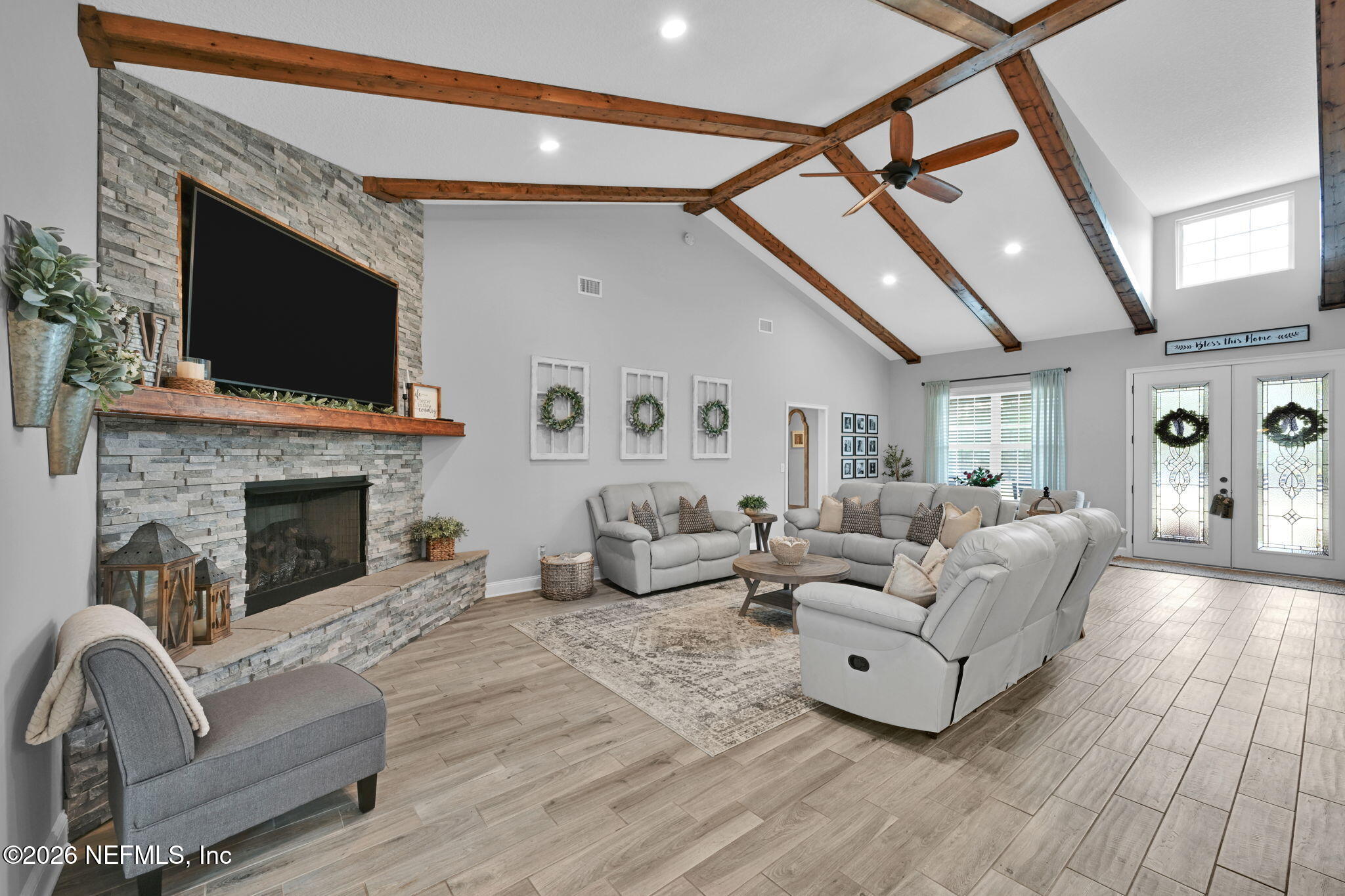 34446 Mitigation Trail Callahan, FL 32011 - Photo 14 of 84 a living room with furniture and a fireplace