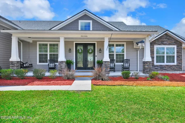 front view of a house with a yard