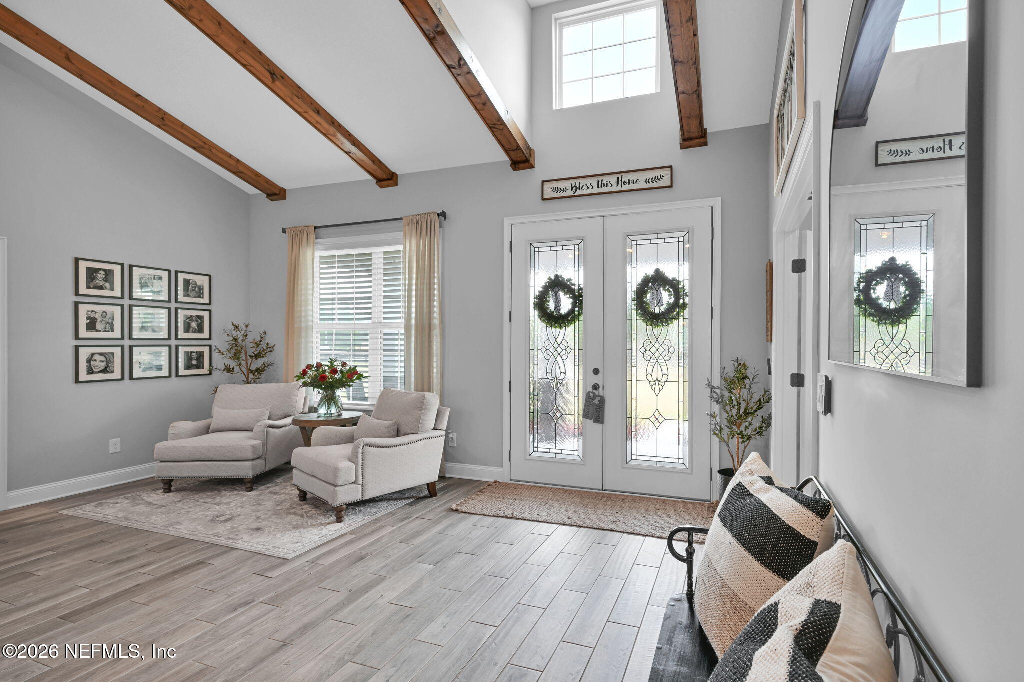 34446 Mitigation Trail Callahan, FL 32011 - Photo 9 of 84 a living room with furniture and wooden floor