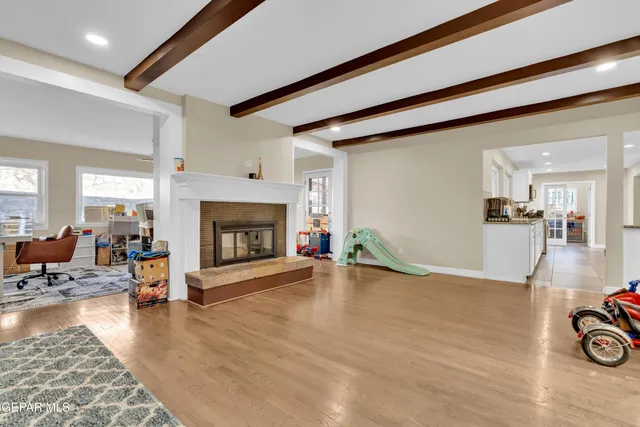 a living room with furniture and a window