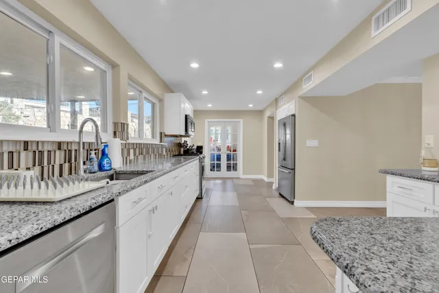 a room with toys and a chandelier