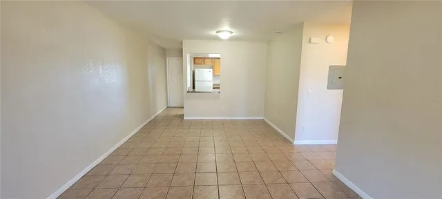 a view of a hallway with white walls