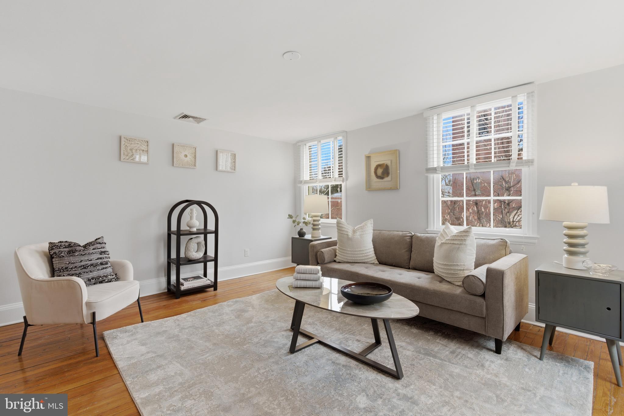 2719 Dumbarton Street Northwest Washington, DC 20007 - Photo 2 of 32 a living room with furniture and a window